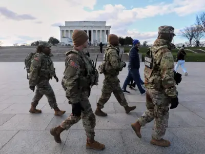 US halts all asylum decisions after shooting of National Guard members