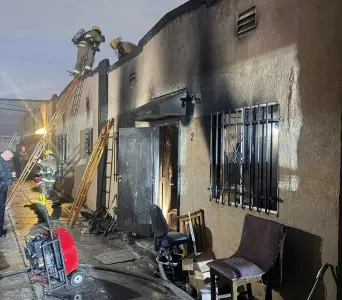 Woman found dead inside burning L.A. bungalow