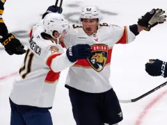 Marchand has 2 assists to help Panthers win 4-3 in his emotional return to Boston
