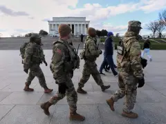 US halts all asylum decisions after shooting of National Guard members