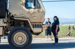 Authorities say about 200 immigrants were arrested in raids on 2 Southern California farms
